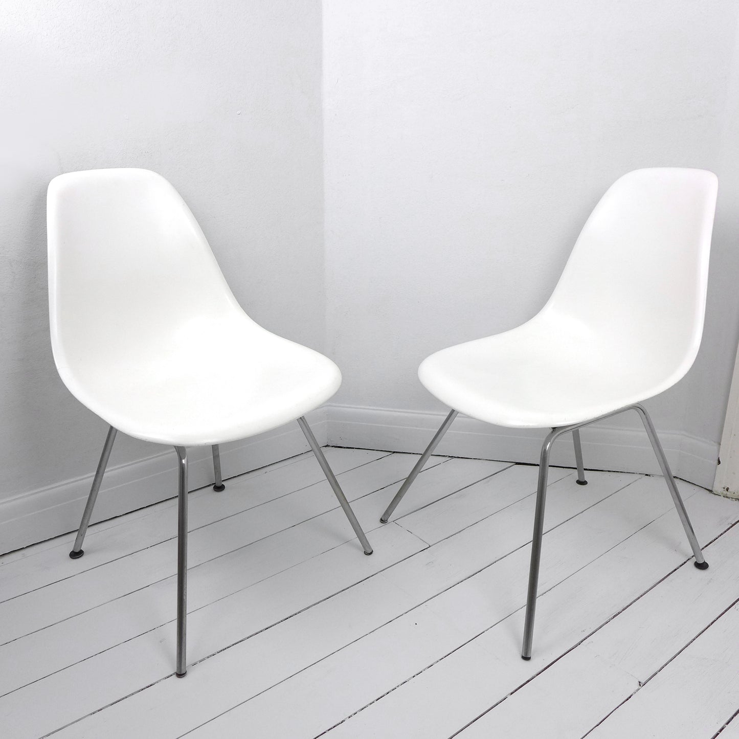 Pair of Eames Plastic Side Chair DSX White circa 2008