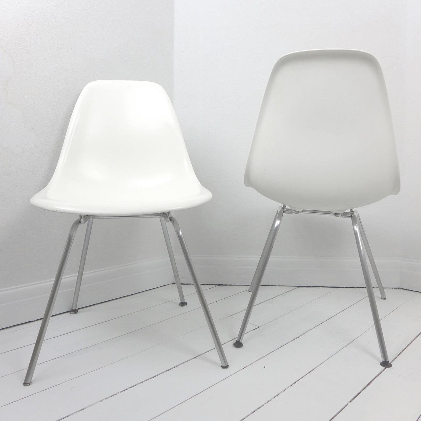 Pair of Eames Plastic Side Chair DSX White circa 2008