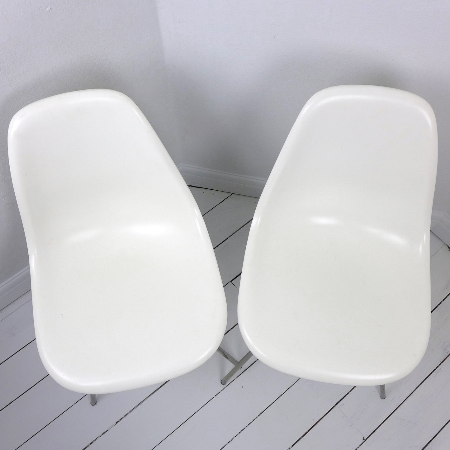 Pair of Eames Plastic Side Chair DSX White circa 2008