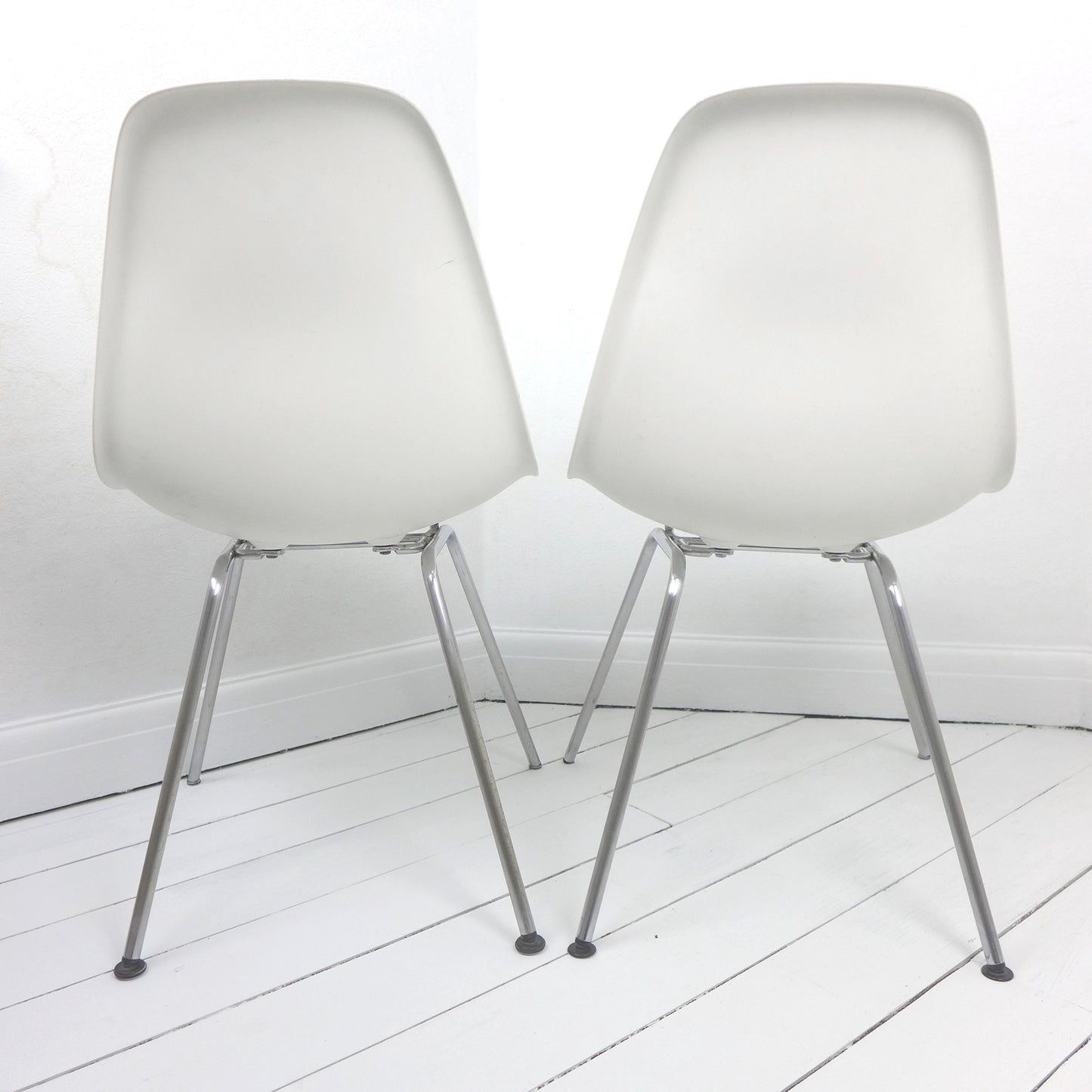 Pair of Eames Plastic Side Chair DSX White circa 2008