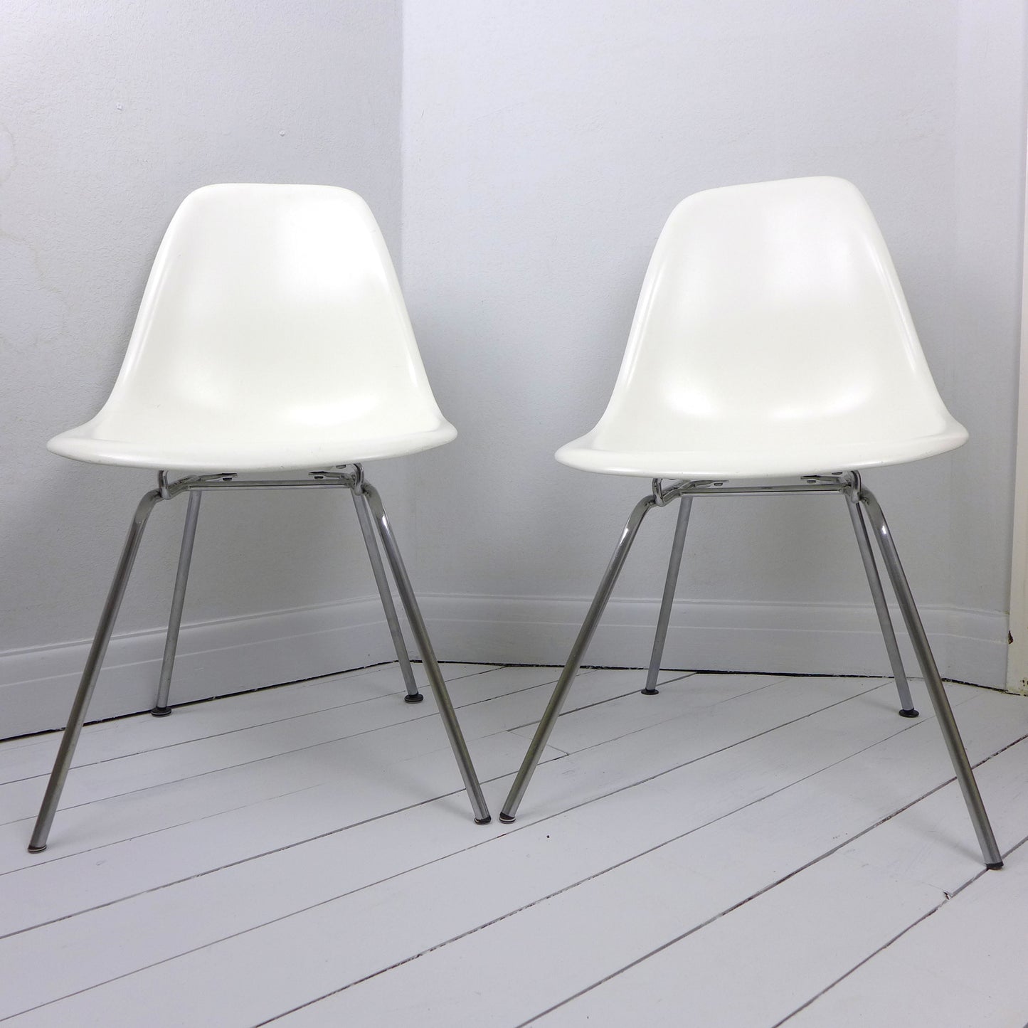 Pair of Eames Plastic Side Chair DSX White circa 2008