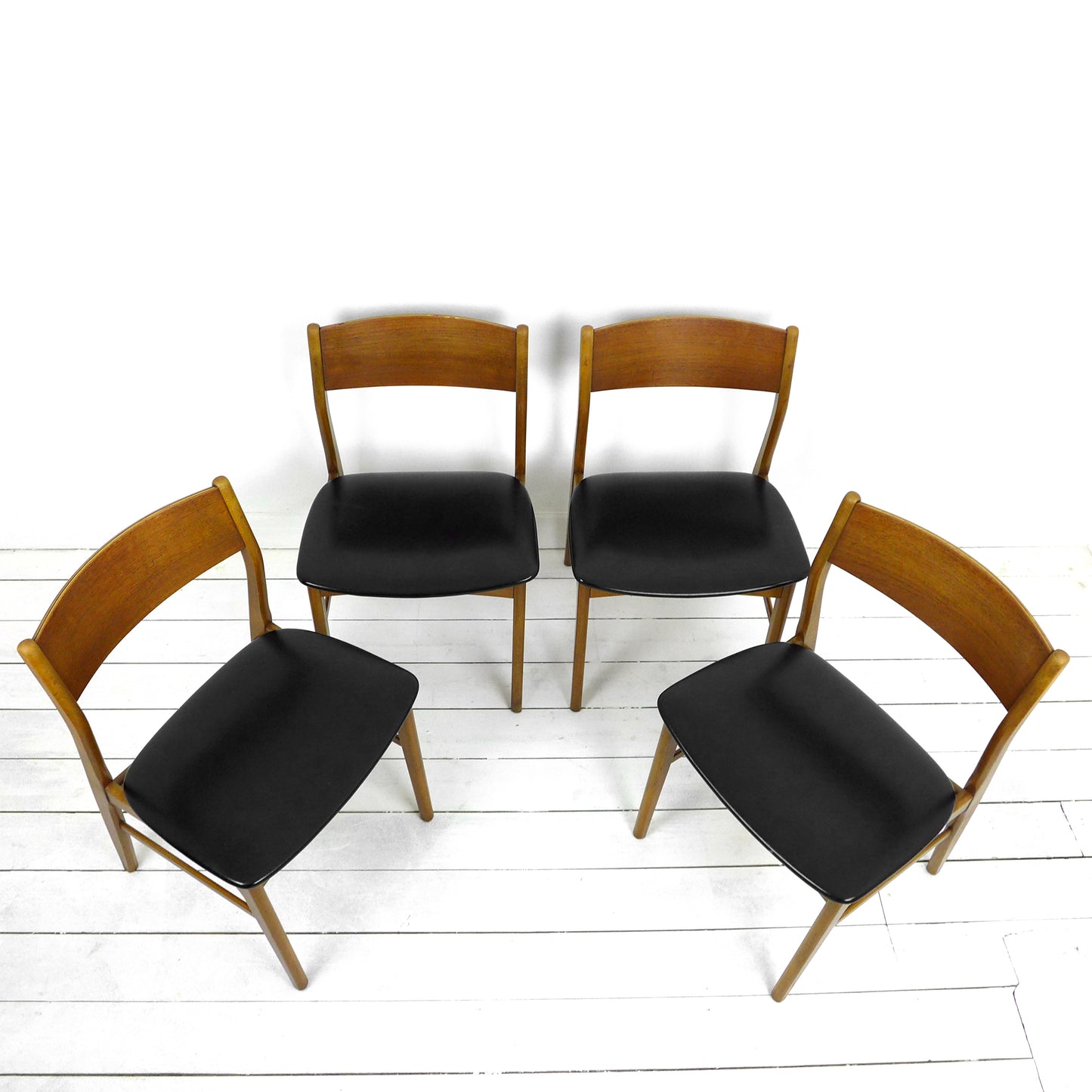 Set 4 Mid Century Dining Chairs in Black Vinyl