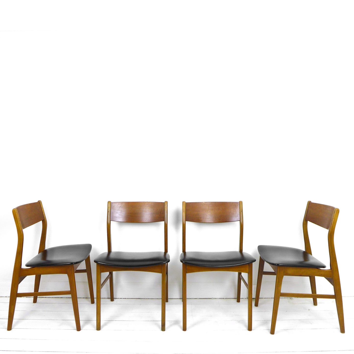 Set 4 Mid Century Dining Chairs in Black Vinyl