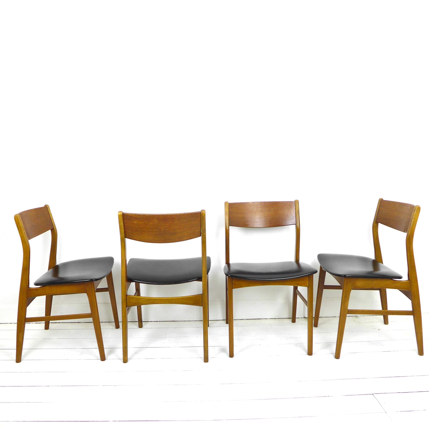 Set 4 Mid Century Dining Chairs in Black Vinyl