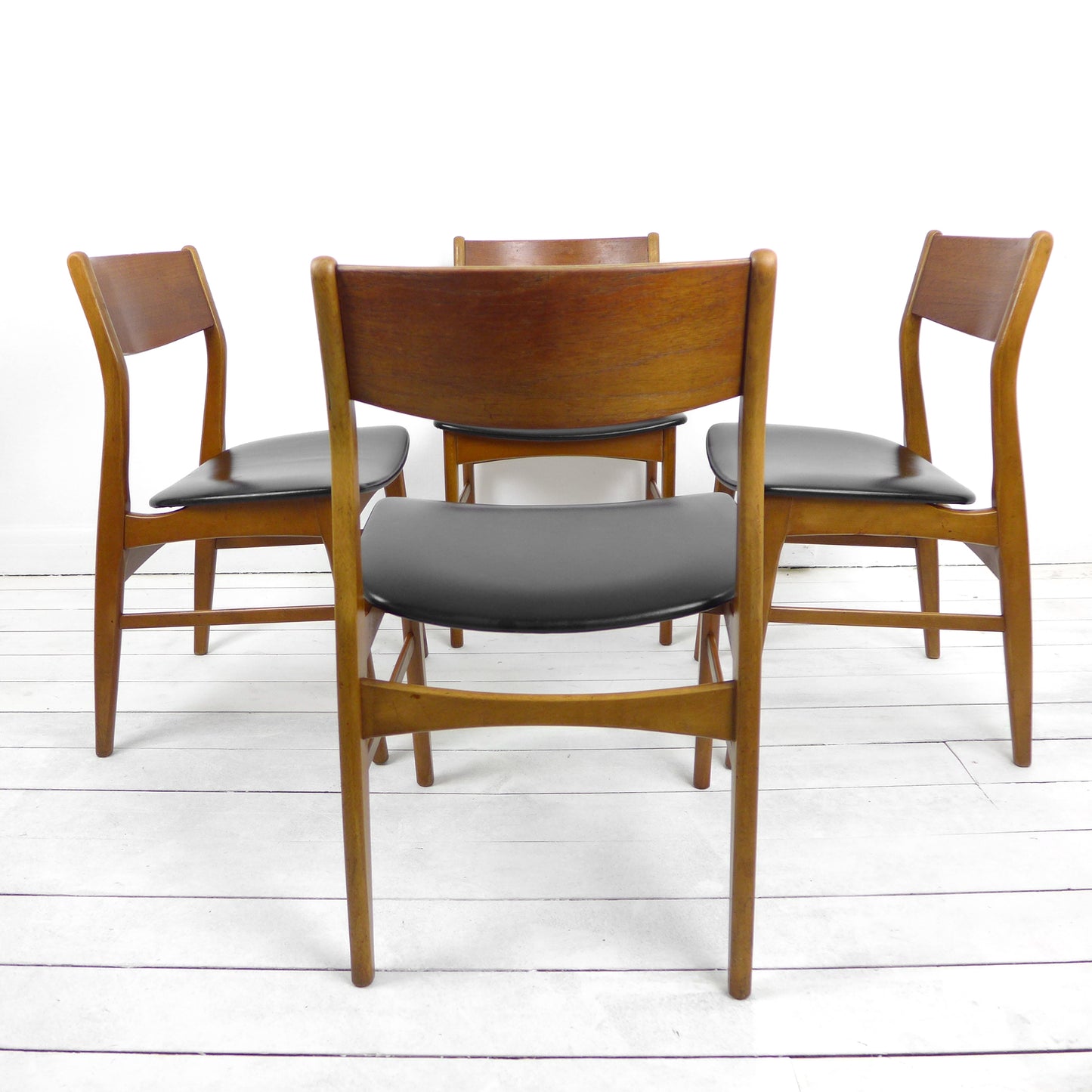 Set 4 Mid Century Dining Chairs in Black Vinyl