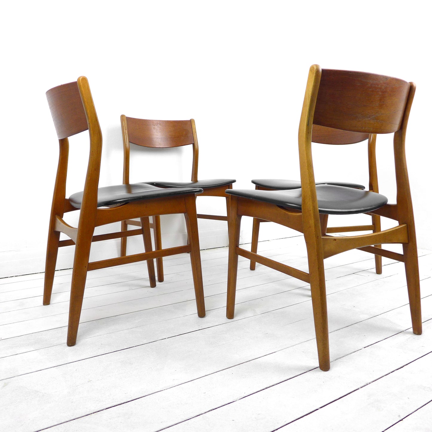 Set 4 Mid Century Dining Chairs in Black Vinyl