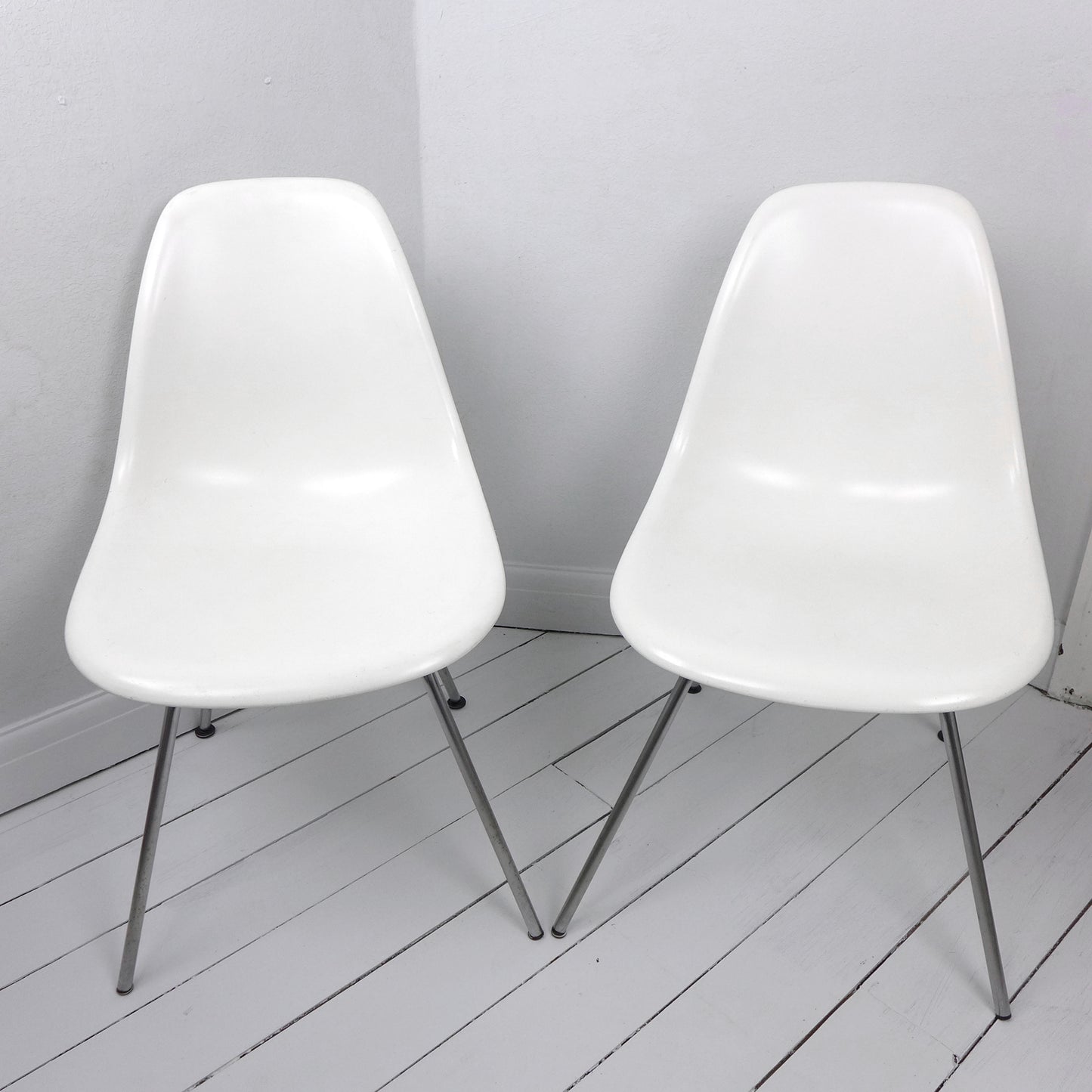 Pair of Eames Plastic Side Chair DSX White circa 2008