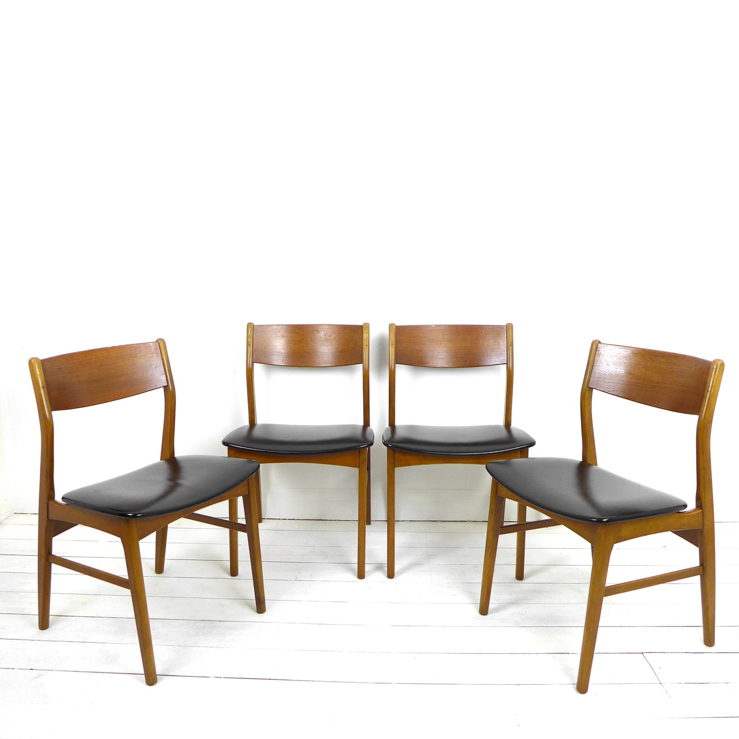 Set 4 Mid Century Dining Chairs in Black Vinyl